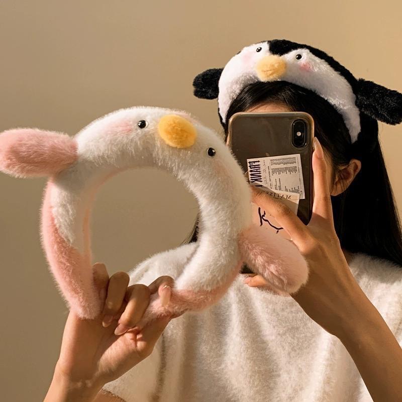 Schattige pinguïn pluche hoofd - Women Accessories Online recensie en prijs