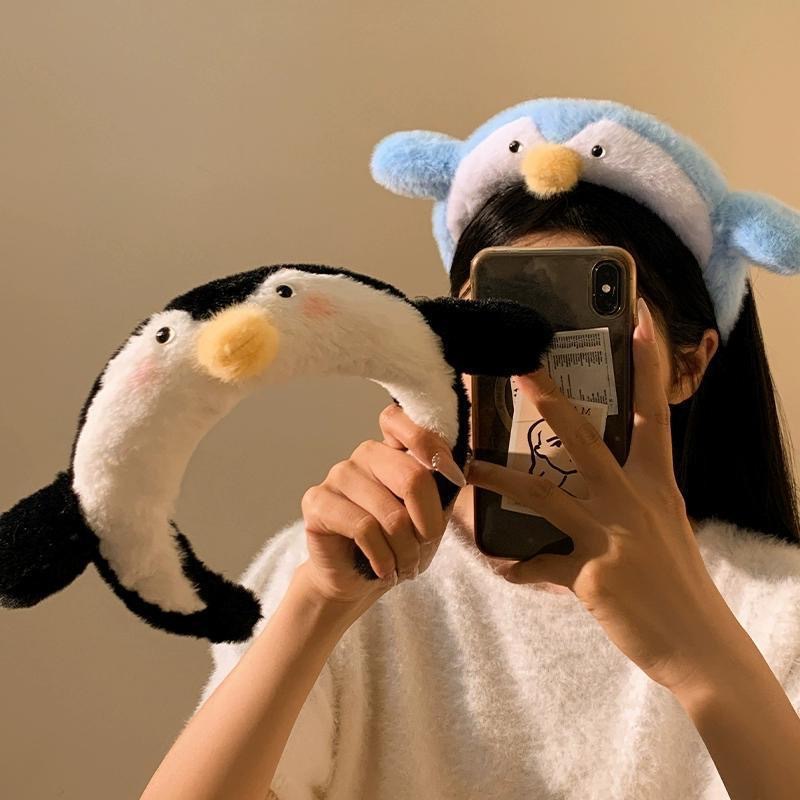 Schattige pinguïn pluche hoofd - Women Accessories Online recensie en prijs